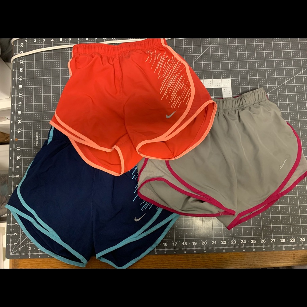 3 pairs of colorful Nike shorts
